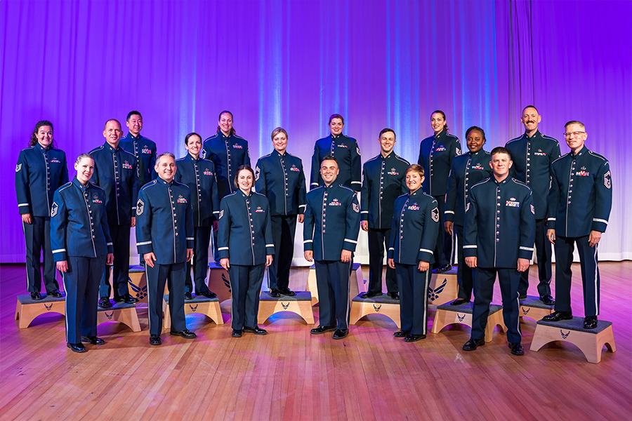 the Air Force singing group posed on stage
